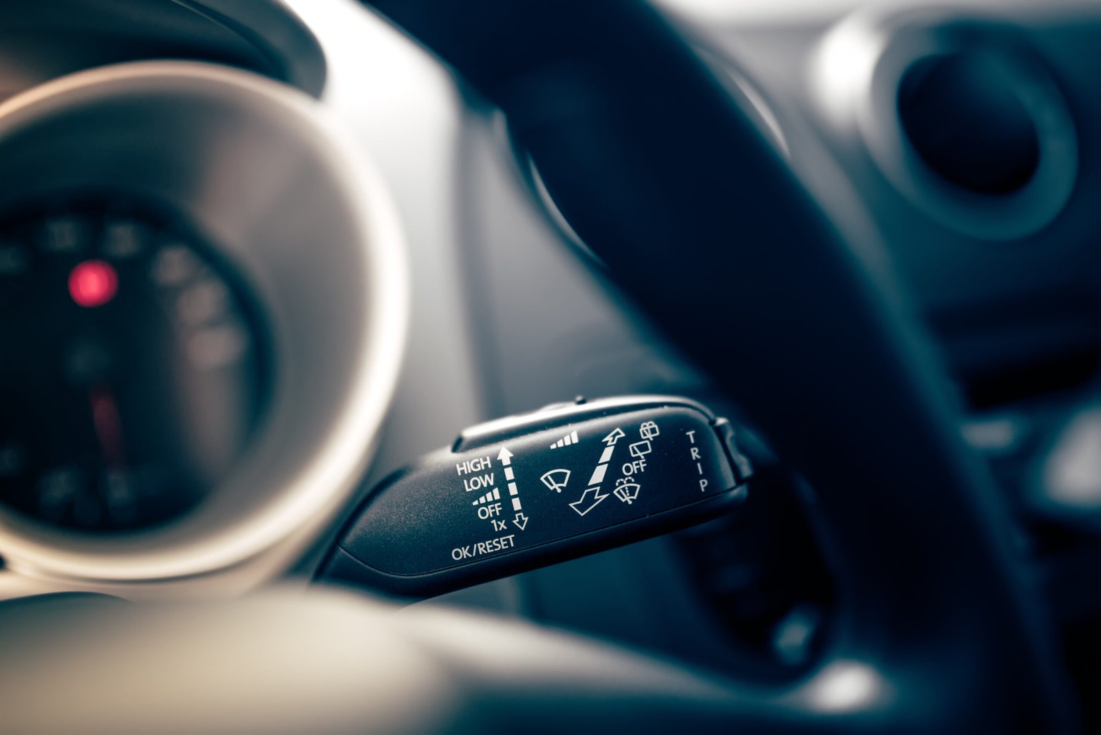 car wiper controls on modern car. Cockpit interior of car with electronic controls of rain wipers